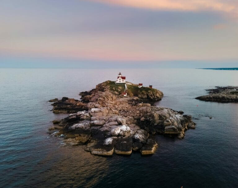 A view of the Nubble Lighthouse in York Maine where our website design company is based - How to Find a Website Designer Near Me